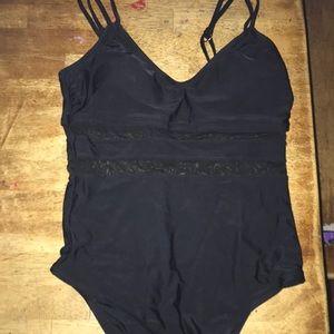 Black one piece bathing suit.